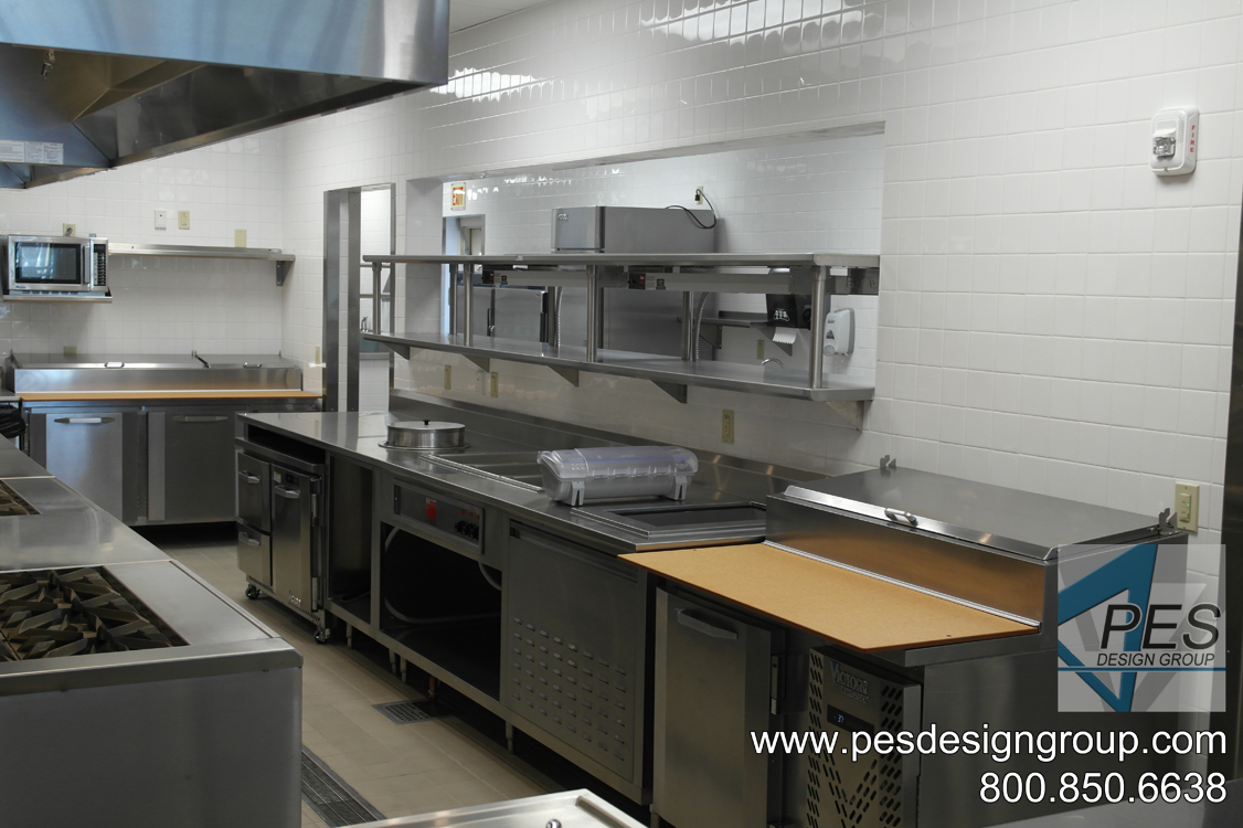 A view of the chef's expediting counter designed for Suncoast Technical College's culinary teaching kitchen in North Port, Florida.